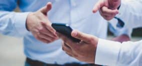 person holding black smartphone