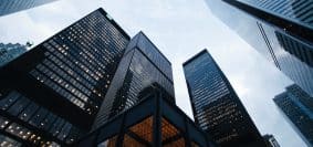 low angle photo of city high rise buildings during daytime